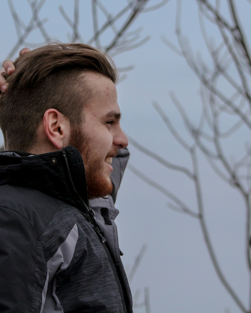 Placeholder portrait of the photographer in profile.