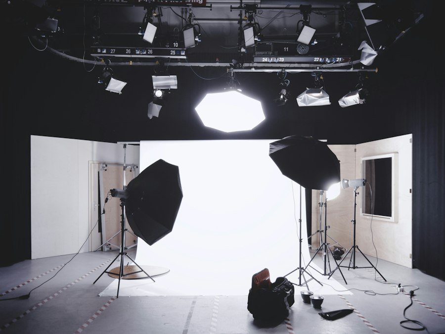 Photography studio with lighting rigs set up.