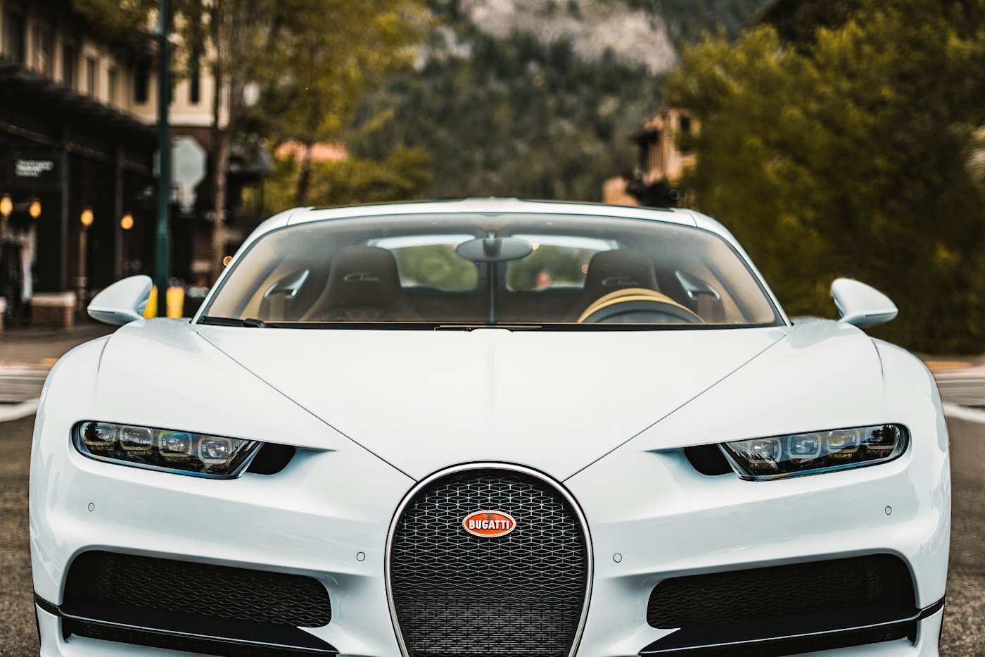 Hypercar photographed head-on in daylight.