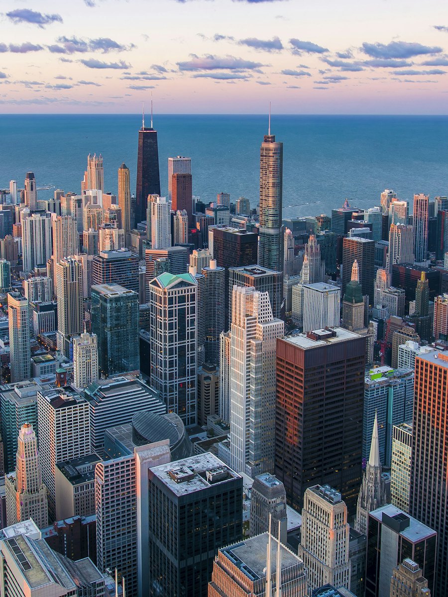 Aerial view of a dense city at dusk.